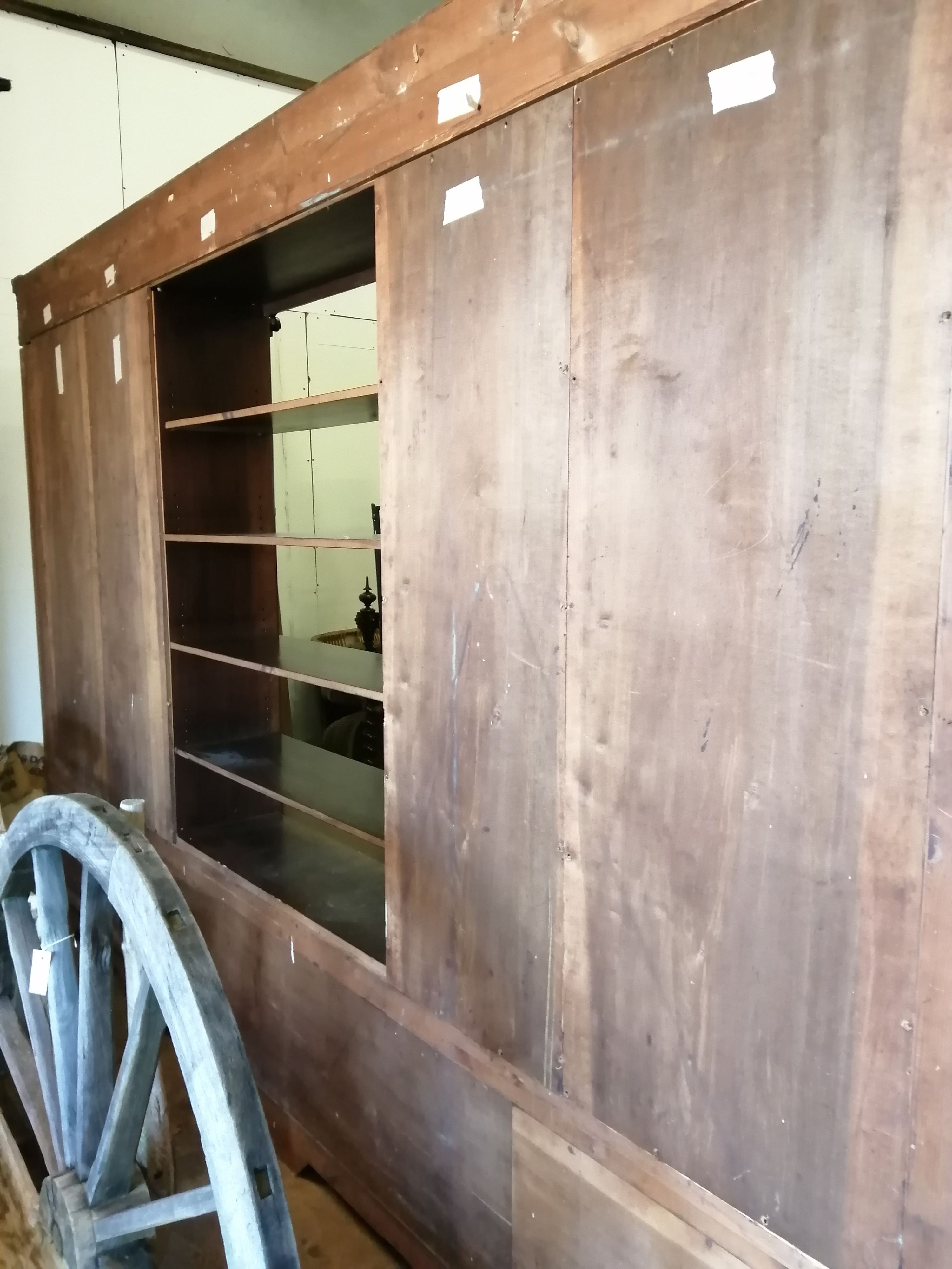 A large French 17th century style walnut bookcase / cabinet, length 360cm, depth 50cm, height 240cm